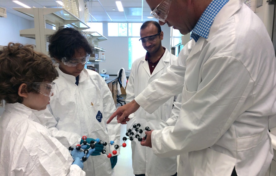 elementary school students learning from ASRC faculty in the nanoscience facility