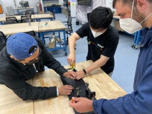 CiPASS students, Juan Tlilayatzi and Zicong Li, working on CAT-sponsored project with James Scholtz.