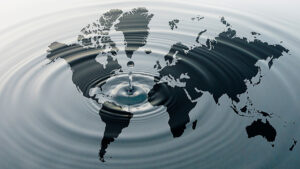 Rippling water over map of globe