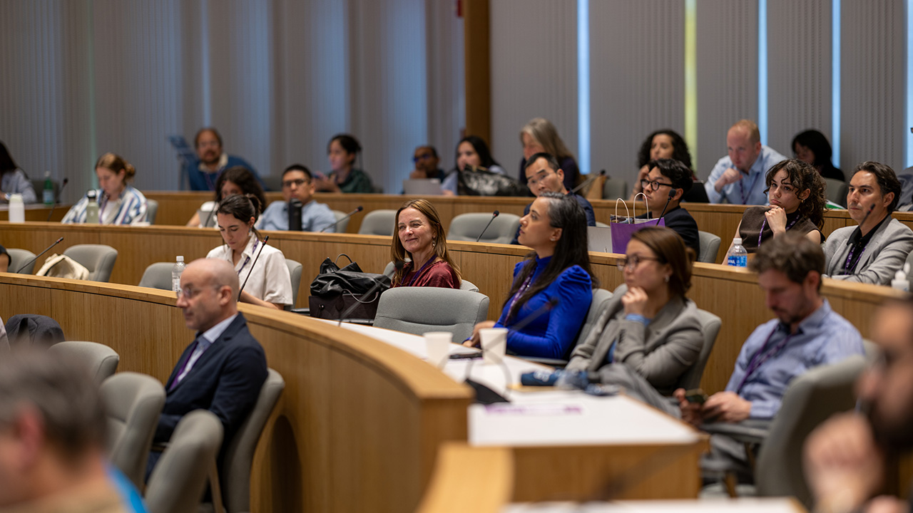A group of people siting in the CUNY ASRC Auditorium