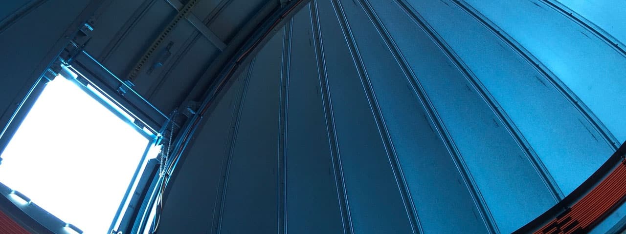 the observatory roof as seen from inside, with the viewing window open