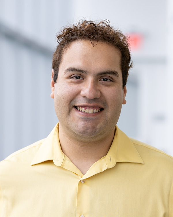 A headshot photo of Alejandro Mundo