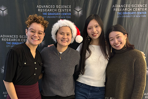 A group of people smiling
