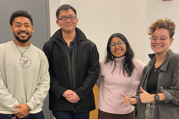 A group of people smiling
