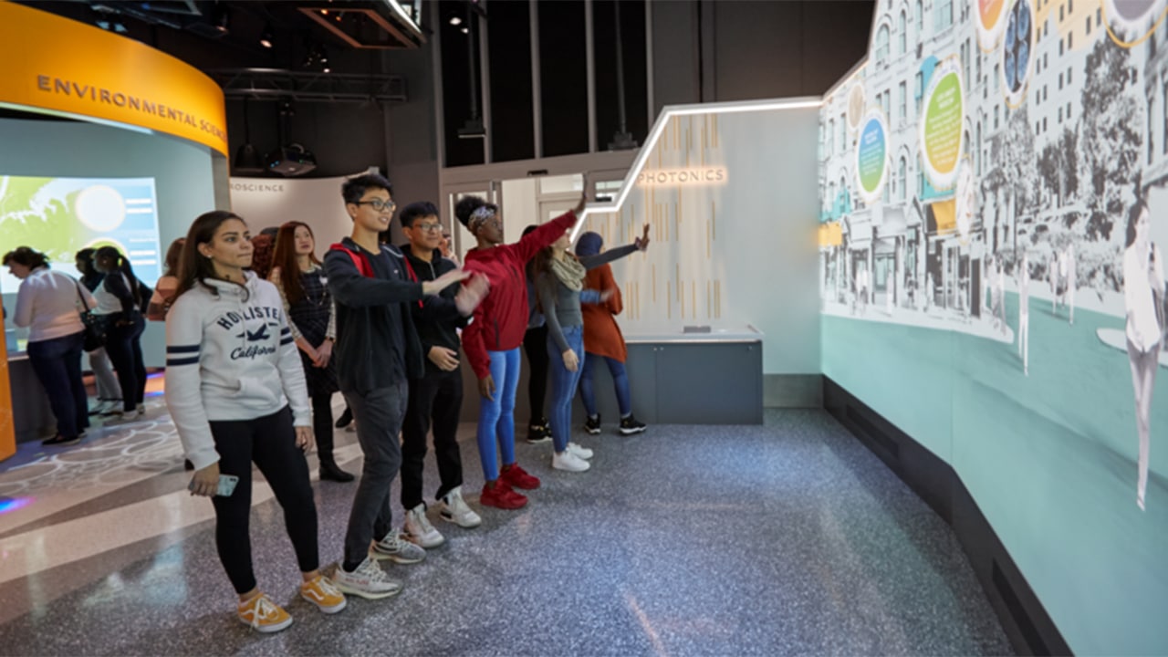 high school students interacting with the digital wall in the ASRC Illumination Space