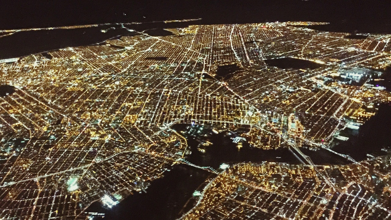aerial image of a a lit city at night